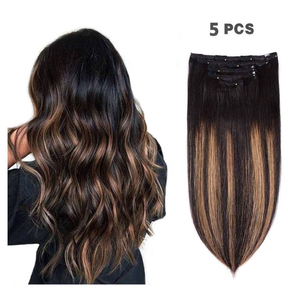 Clip in human hair extensions